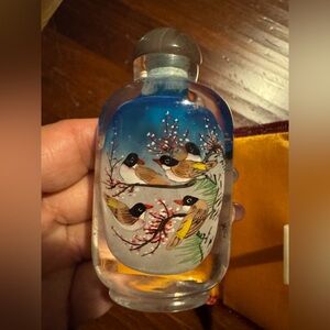 Red Silk box with painted glass bottle